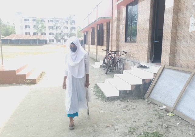 Yasmine walks three kilometers to college on one foot